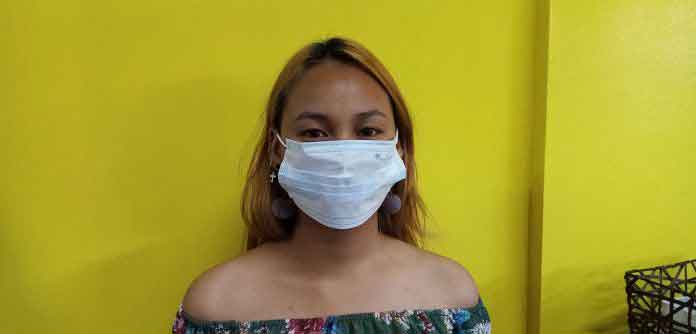 Not recommended way of how to wear a surgical mask. | Photo by Richard D. Meriveles