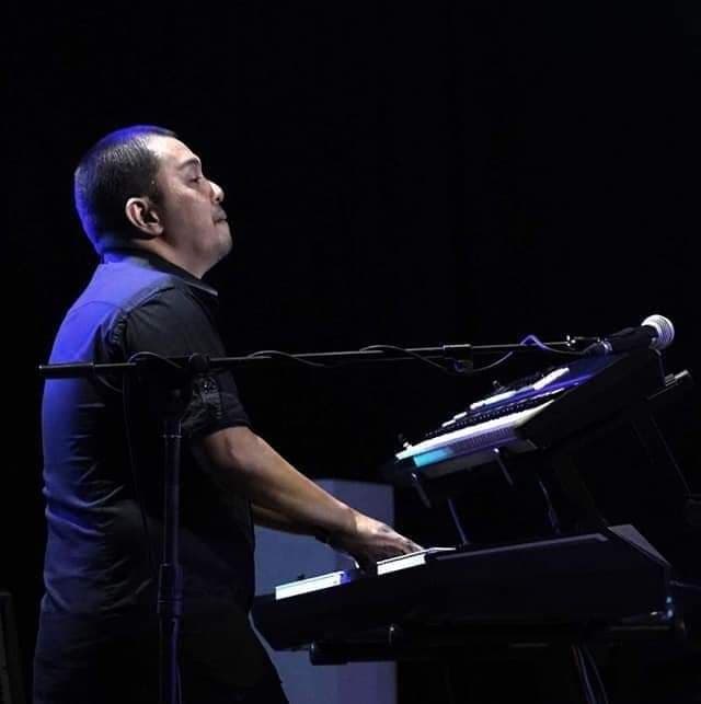"I started playing since I was 12," Michael says. Here flexing his piano playing skills. | Photo from Michael Tambasen's Facebook page