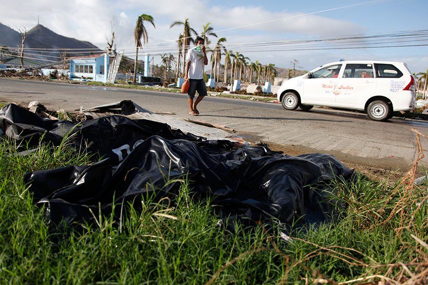 A WEEK AFTER 8 November 2007, some dead bodies placed in bags, have yet to be collected in Tacloban City after superstorm Yolanda struck the Philippines. | Photo by Julius D. Mariveles