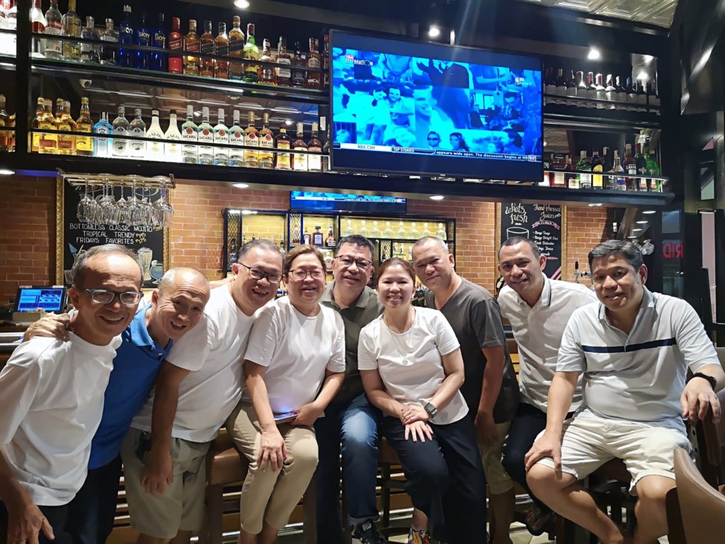 post-dictatorship abs-cbn host, local journo passes on 1 Nick Lizares, third from left, with his eight other siblings among them Larry, second from right, in a photo taken last year in a pub in Metro Manila. | Photo by Issa Lizares used with permission