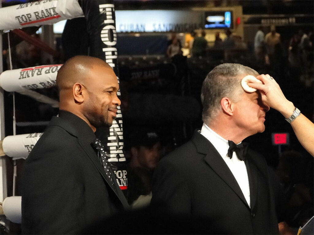 "Roy Jones, Jr. and Jim Lampley at the Yankee Stadium, Bronx, New York on June 5, 2010." by Bryan Horowitz is licensed under CC BY-SA 2.0