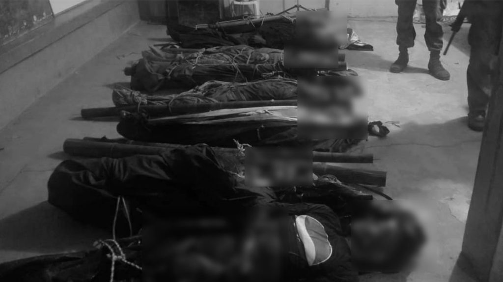 The bodies of suspected rebels slain in a firefight with soldiers 23 March in an upland village in Guihulngan City in improvised bodybags. | Photo courtesy of 303rd IB.