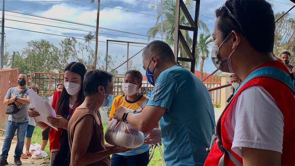 HIMAMAYLAN City Mayor Rogelio Tongson leads intensified aid efforts to residents in his city affected by Typhoon Odette. | Photo courtesy of Himamaylan City Mayor's Office