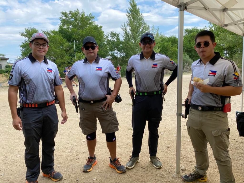 Luzuriaga Shooting Family. (from right) Brothers Carlos, Thomas, Charles (father of the siblings), Joshua at the 2022 Extreme Euro Open in the Czech Republic. Thomas finished third overall. | Photo from Marion Tricia Valderrama personal collection used with permission