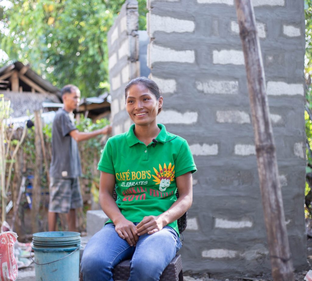 Jartie, one of the Output-Based Aid – Blended Finance project beneficiaries in Cauayan