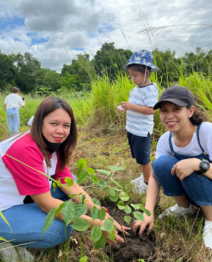 Housekeeping Department’s Guest Services Associate Athen and Bryan participating in the Tree Planting activity along with their family members.