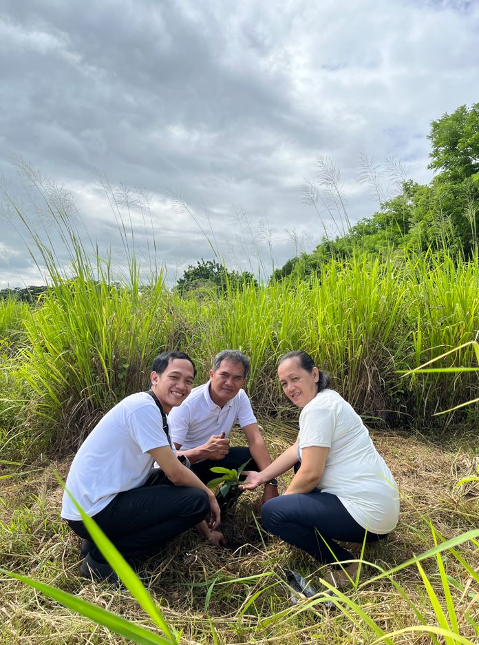 Housekeeping Department’s Guest Services Associate Athen and Bryan participating in the Tree Planting activity along with their family members.