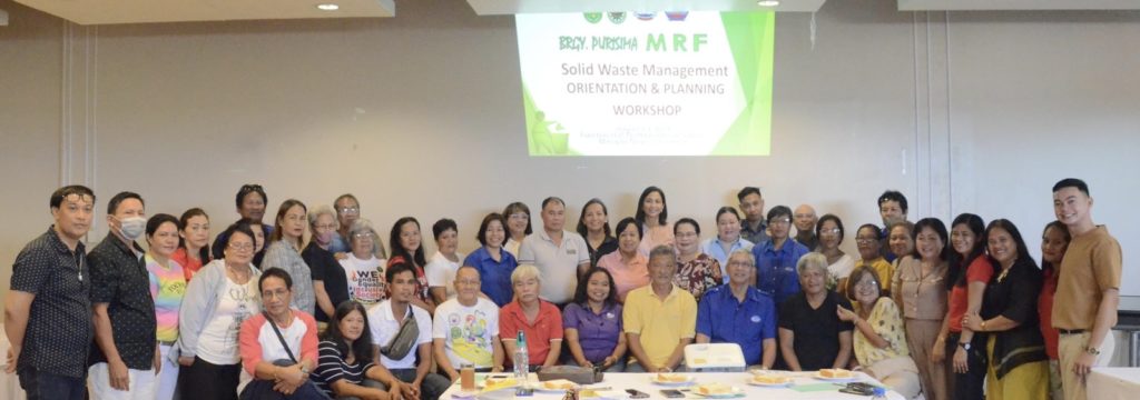 VMC President Linley Retirado and MENRO Head Victor Lapides at the Brgy Purisima MRF: SWM Orientation & Planning Workshop, together with representatives from the Municipal LGU, DENR-EMB, Barangay LGU and zone leaders, health workers, VMC and other key sectors in Manapla.