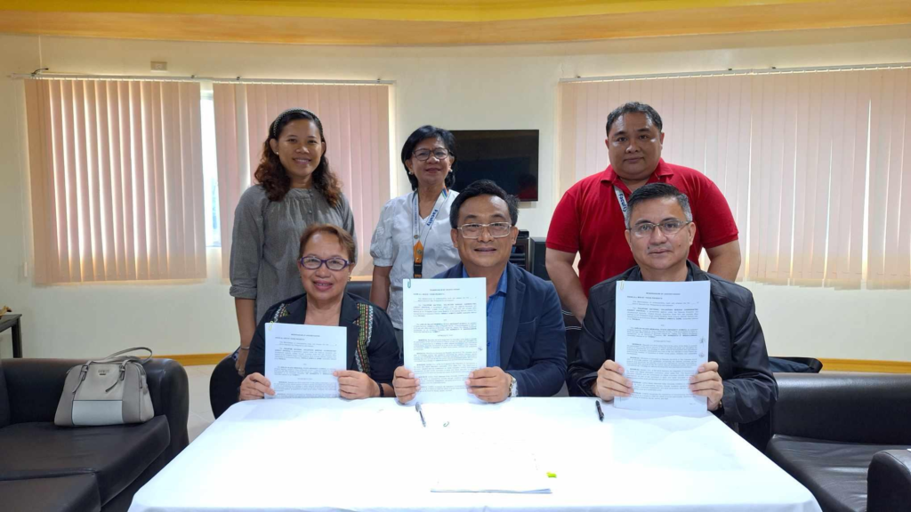 (seated from left) Chief EDS Joyalit Tigres of the Policy Formulation and Planning Division of NEDA VI, PNVSCA Executive Dir. Donald James Gawe, VPAA Jay Estrellas, (standing from left) Asst. VPAA Ma. Riza Manalo, OSAS Dir. Maria Victoria, and CIMD Dir. Francis Jose Bearneza
